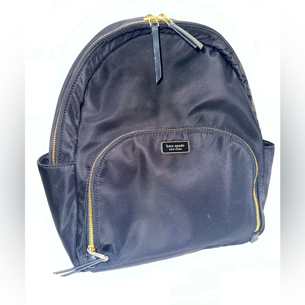 Kate Spade Chelsea Mini-Backpack-Black and Gold. Small rip on the top handle